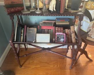 vintage Georgia- style mahogany book trough table with turned legs and an open trough shelf