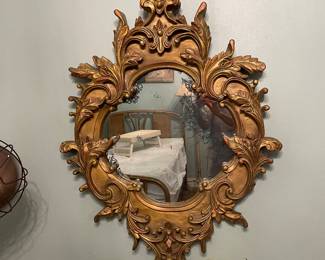 Ornate plastic mirror