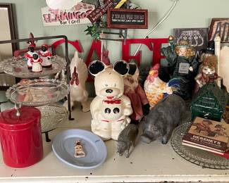This is a SUPER VINTAGE kitchen.  Cookie jars, hens, pigs …