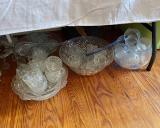 Four punch bowls with matching cups.  $30 each