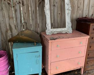 Pink metal dresser and blue cabinet