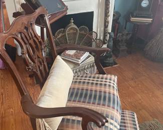 Vintage Chippendale arm chair with professionally upholstered seat, coordinating metal foot stool