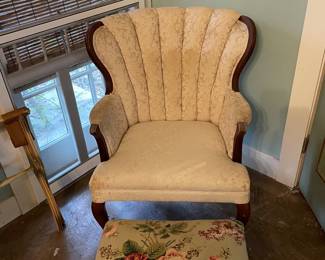 Chanel back upholstered arm chair, floral ottoman