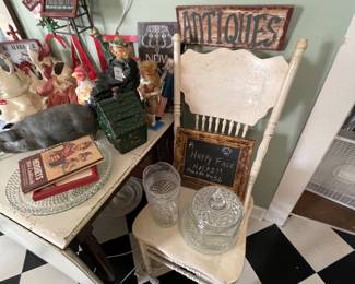 This is a SUPER VINTAGE kitchen.  Cookie jars, hens, pigs …