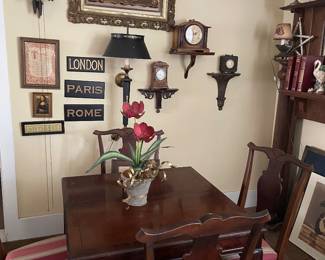 Four Chippendale dining chairs 