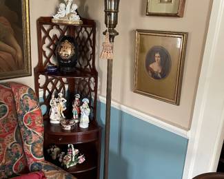 Corner display shelf with center drawer