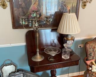 Antique mahogany swivel top game table with carved spiral pedestal base