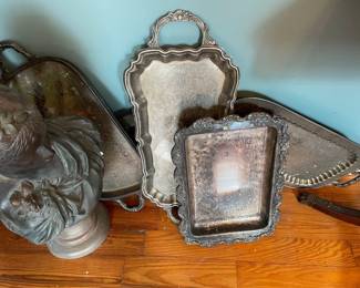 At least 10 heavy, good quality silver plate serving trays, reticulated, footed, with handles, round, square.    Unpolished and priced accordingly 