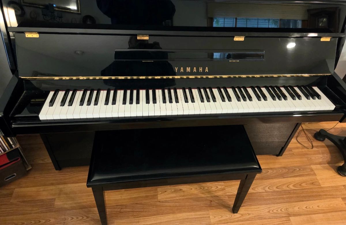 Yamaha M1E piano