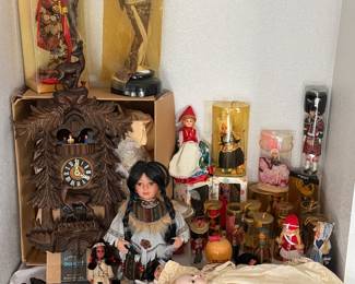 Folk dolls and cuckoo clock