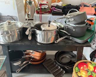 Several sets of pots and pans