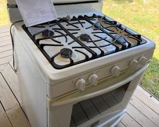Frigidaire gas stove still works great! Very clean. Original owner manual.