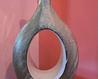 Abstract Metal Sculpture with Spiral Motif fifth image