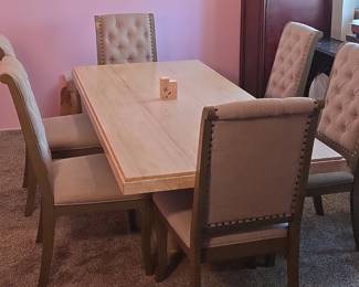 Marble Top Dining Table with Upholstered Chairs  Esteemed Broadcaster Estate