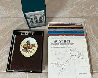 An assortment of vintage vinyl records and variety of books