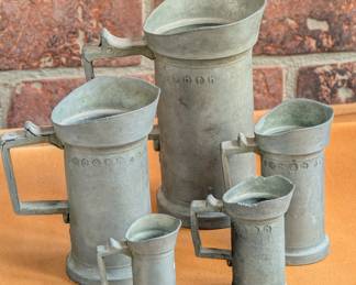 Antique Dutch pewter measuring cups