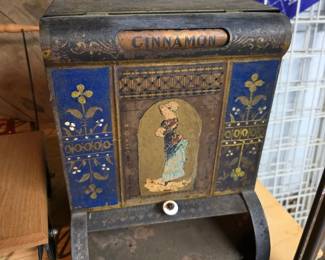 antique toleware or tin cinnamon dispenser, 19th-century general store