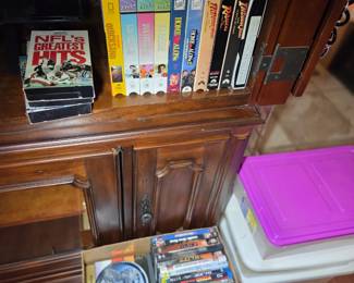 DVD,s, VHS's storage bins. TV entertainment console 