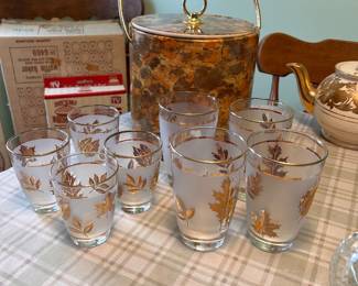vintage Libbey Golden Foliage set includes frosted tumblers and a matching caddy adorned with 22-karat gold leaf motifs