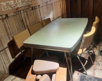 vintage 1950s kitchen dinette set featuring a green "broken ice" pattern Formica top with a metal edge band. 6 chairs w/ brand new replacement cushions for 2 chairs