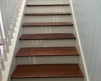 Split staircase to access upstairs. 