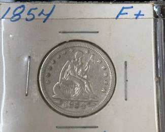 Coins include Seated dimes and half dimes Indian head cents Barber half dollars, quarters, and dimes including a 1892 1st year of issue Seated Liberty coins including a 1840 Seated Liberty dollar coin A large variety of Buffalo nickels nickels including a possible Legend coin 1937 3-leg buffalo Shield nickels including 1866 1st year of issue 1946 Booker T half dollar 1st Edition