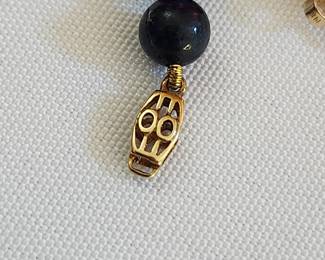 With earrings