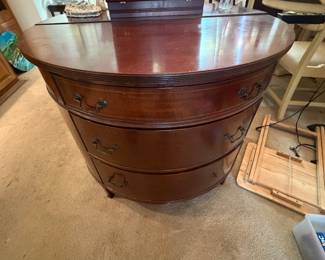 French empire half round three drawer chest