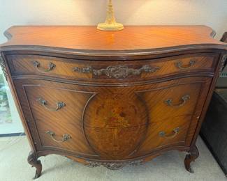 Antique serpentine front three drawer dresser