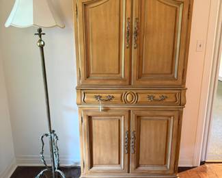 Hutch and antique brass lamp