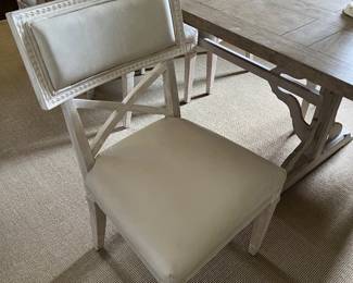set of white leather dining chairs in perfect condition