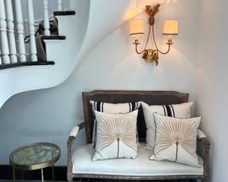 double sconce, caned settee