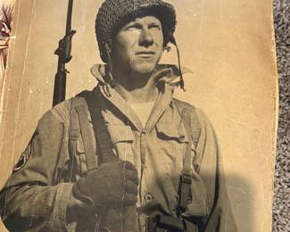 This is a WWII US Army 96th Infantry Division unit history book, published between 1942 and 1944.The publication is a softcover book that includes photographs documenting the division's training and history.Some copies of this book were owned by high-ranking officers, such as Brigadier General Claudius Miller Easley.The division was nicknamed the "Dead Eye" division.