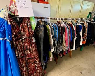 All clothes on the rack two dollars each sizes 16 up to plus size