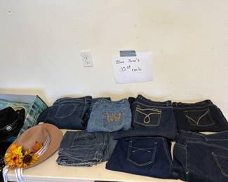 All the jeans on the table are $10 each. Most of them are size 16 to 18.