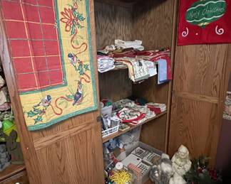 Oak cabinet full of Christmas