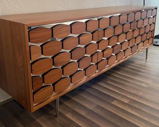 $1,500.  Honey Sideboard, 3 Door, in Walnut Finish and Silver Mirror.  84” x 19” x 30.5”. Slight Damage Inside