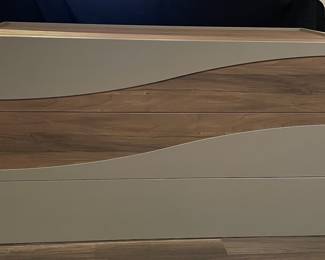 $275. Brown Dresser with Wave Design.  48.75” x 20.75” x 27”