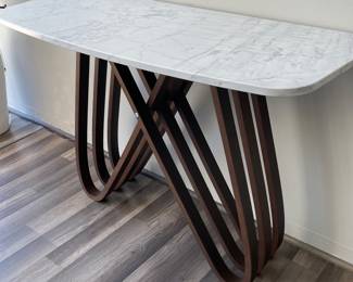 $1,450.  Arpa Console Table with Dark Oak Base and White Marble Top.  45.7” x 18.1” x 30.3”