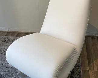 $2,150. Ricciolo Convertible Armchair in White Eco Leather. 37.4” (57” extended) x 25.6 x35.4”