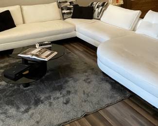 $6,995. Valentini Eduard Sectional in Cream.  Comprises of 1 x Lateral 3 Seater Sofa (left), 1 Curved 3 Seater and Chaise. 123”x 37”, 145” x 37” (includes Chaise Width).  Chaise Depth 58”