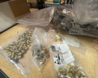 Brass washers, reducers, Chicago posts.