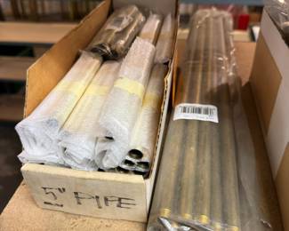 Brass pipes. Some polished.