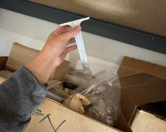 Miscellaneous machined aluminum lamp parts.