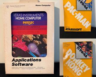 vintage Parsec video game cartridge for the Texas Instruments TI-99/4A vintage Atarisoft game box for the TI-99/4A computer version of Pac-Man 1983, Donkey Kong for the Texas Instruments TI-99/4A