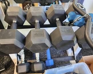 WEIGHTS AND WORKOUT EQUIPTMENT. TONS OF THIS