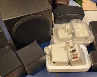 Sony and Polk Audio wired speakers (and polk woofer). Additional speakers not pictured