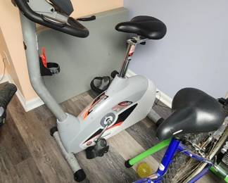 Upright exercise bike, bike with inside roller stand