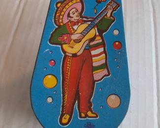 US Metal Toy Mfg Co. Mexican Musician Tin Litho Noisemaker