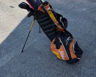 Titleist Golf Bag with Adams Golf Tight Lies Clubs